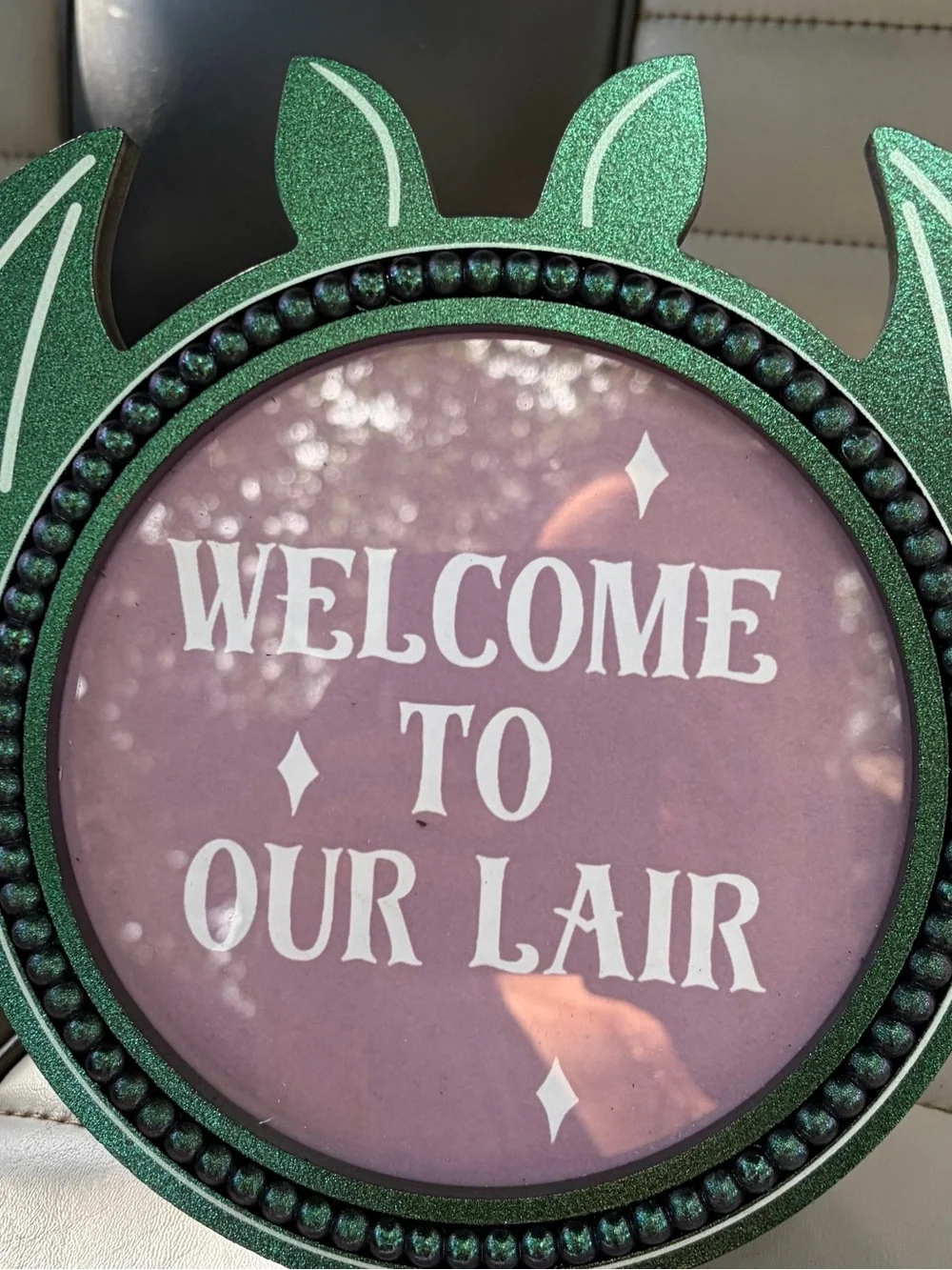 Welcome to Our Lair Pink Decorative Wall Plaque - Home Party Supplies